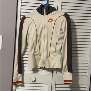 White, orange, grey nike zip up